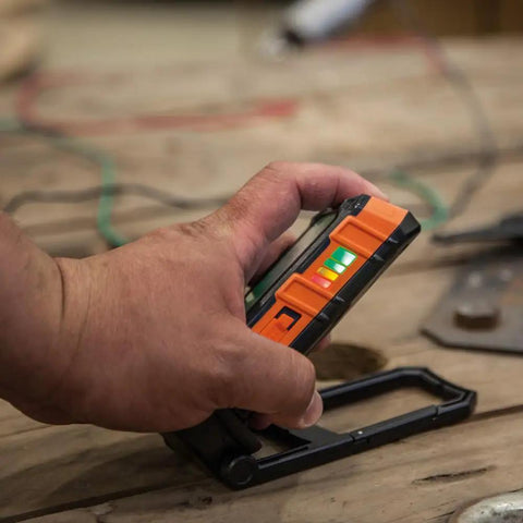 Hand adjusting Go To Rechargeable LED Work Light With Kickstand And Magnetic Mount And Carabiner for work or camping.