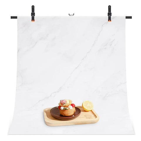 Heavy Duty Backdrop Clamps 4 Inch 12 Pack Muslin Clips securing white backdrop with dessert display