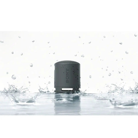 XB100 Wireless Bluetooth Portable Speaker With Deep Bass IP67 Waterproof Dustproof Super Compact Travel Buddy in water splash