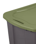 Roomy 17.5 Gallon Plastic Storage Bin With Secure Stackable Lid And Opaque Base, Full Grip Handles, showing the green lid detail.