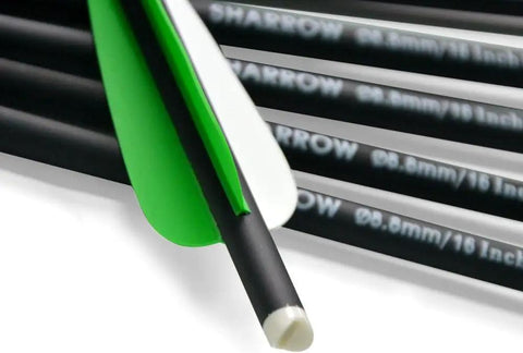 Close-up of green and white fletching on 16 Inch Carbon Crossbow Bolts With 4 Inch Fletching Pro Grade 125 Grain Tips And Replaceable Broadheads