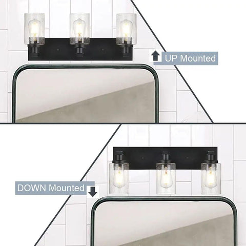 Three Light Vanity Bathroom Light Fixture Over Mirror Black Finish With Cylinder Seeded Glass Shades For A Sleek Dope Look In Your Bath