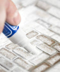 Easy Fix White Tile Grout Paint Marker Kit 5 Pack With Narrow 5mm Tips Waterproof Colorant And Sealer Pen in use on grout