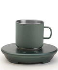 Top Rated Thermal Drink Mat Cup Warmer Keeps Your Brews Piping Hot Or Ice Cold with matte green cup and warmer.