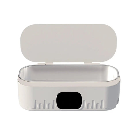 Knockout Portable Ultrasonic Cleaner For Glasses And Jewelry Using High Frequency Vibration And Eco Friendly Deep Wash Tech To Make Your Treasures Look Slick And Sparkling Fresh In Pink, open design with a sleek white housing.