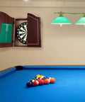Official Sized Dart Board Cabinet Set With 18 Inch Dart Board, 6 Steel Tip Darts, And Chalkboard Scoring in a game room
