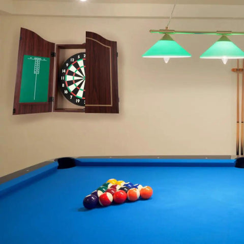 Official Sized Dart Board Cabinet Set With 18 Inch Dart Board, 6 Steel Tip Darts, And Chalkboard Scoring in a game room