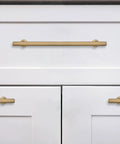 10 Pack 5 Inch Center To Center Champagne Bronze Satin Brass Cabinet Pulls on white cabinets, installed view