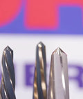 Various drill bit tips with Three Eighths Inch Bridge And Construction Reamer With Black And Gold Finish visible in front.