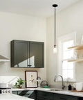 Braelyn 8.5 Inch One Light Mini Pendant With Clear Seeded Glass And Classic Pewter Finish in a modern kitchen setting