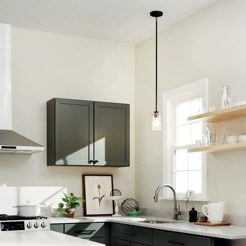 Braelyn 8.5 Inch One Light Mini Pendant With Clear Seeded Glass And Classic Pewter Finish in a modern kitchen setting