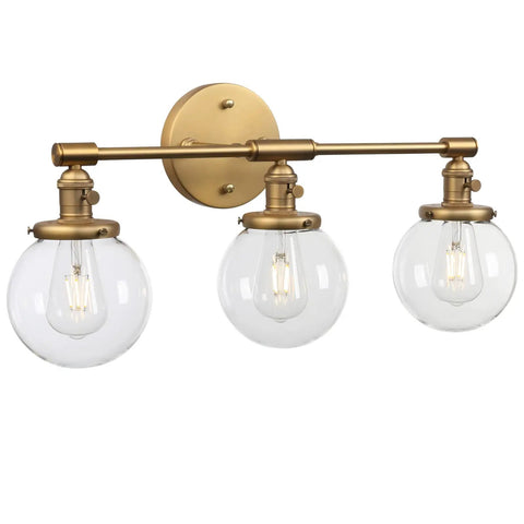 Three Light Vintage Industrial Bathroom Vanity Wall Sconce With Handblown Clear Glass Globes And Antique Gold Finish, 25.2 Inch Wide Triple Light Bath Fixture For A Soft Industrial Look