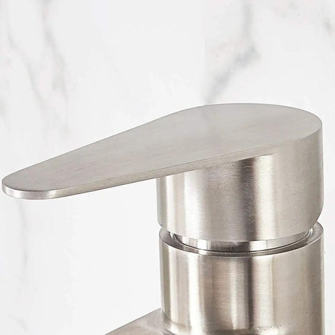 Close-up of Vessel Sink Faucet With Waterfall Spout In Brushed Nickel Finish Single Handle 1 Hole Vanity Faucet Tall Lavatory Faucet