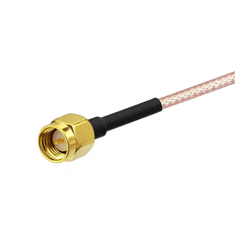 Close-up of a SMA Male to SMA Male RG316 Pro Grade Coaxial Jumper Cable showing the gold connector and pink coaxial wire.