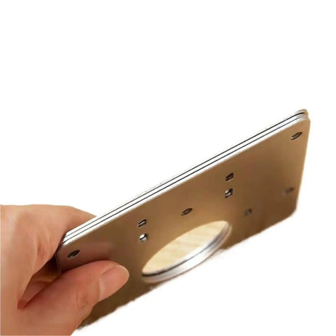 Hand holding Soft Close Cabinet Hinge Repair Plate Kit With Hydraulic Dampers for Quiet No Slam Cupboard Door Mounting Brackets