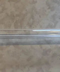 UV2400XLAM1 Replacement Lamp For In Duct Air Cleaners Compatible With UV2400U1000 And UV2400U5000 placed on a surface