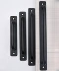 Set of black cabinet handles in four sizes on a white and wood background, similar to Gold Aluminum Alloy Cabinet Handles And Knob Set