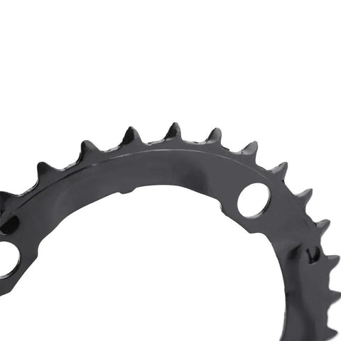 Close-up of teeth and mounting holes on 32T 104mm BCD Steel Round Chainring for 9 Speed Mountain Bikes Beefy Steel Build With Quiet Ride And Top Notch Chain Retention Durable MTB Replacement Part.