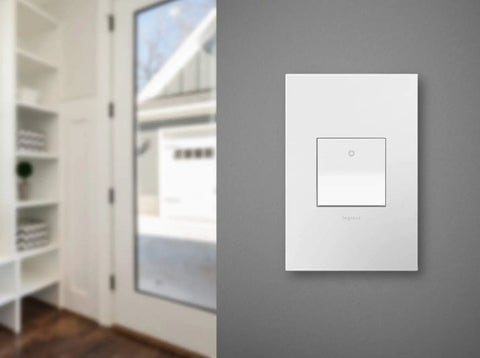 Upgrade Your Home Lighting With A 15 Amp 1 Or 3 Way Paddle Switch And Matching White Wall Plate 4 Pack, installed on wall.