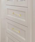 Gold U Shape Crystal Glass Cabinet Knobs Set, 10 Pack Sparkling Drawer Pulls installed on white cupboard