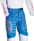 Moose Racing motocross gear, long sleeve shirt and pants in blue and white, designed for athletic performance.