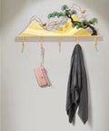 Sick Wall Mount Coat Rack with 5 Sturdy Hooks for Your Entryway Glow Up, showcasing a decorative design with coat and bag.