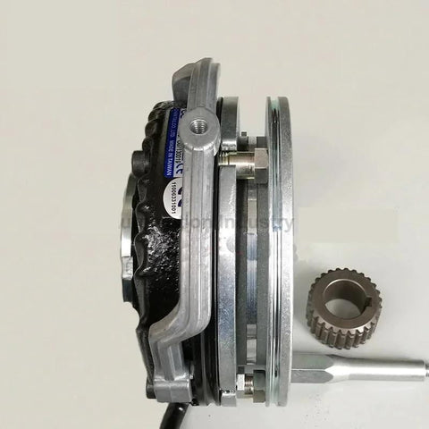 Electromagnetic clutch and brake assembly with silver metal housing and gear ring; 15mm bore.