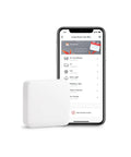 White Mini Smart Remote Hub With IR Blaster For TV And Air Conditioner 2.4GHz Wi Fi Compatible shown next to smartphone app interface.