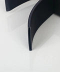 Close-up view of USZWBY Bathroom Sink Tempered Glass Bathroom Vessel Sink structural detail, showcasing sleek black curves.