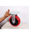 Heavy Duty Rigid Top Plate Caster Featuring Badass Polyurethane Wheels With Double Ball Bearings for displaying size and support features.