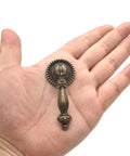 4 Pack Antique Drawer Pulls Vintage Bronze Finish Large Finger Pull Handles for Drawers Cabinets Desks and Jewelry Boxes shown in hand