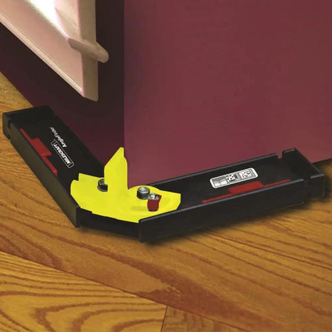 Angle Finder And Layout Jig For Crown Molding And Trim Work With Miter Saw Setup near a corner wall with retractable edge guides
