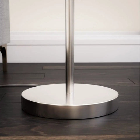 Base of Ultra Tall Industrial Tree Floor Lamp With Three Adjustable Spotlights In Brushed Steel Finish on wooden floor
