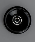 Top view of a black Premium PU Roller Skate Wheel With Bearings Replacement For Indoor Skating on various surfaces.