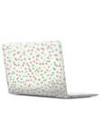 Pink And Blue Glitter Confetti Peel And Stick Wallpaper Sample For Quick, No Fuss Decor on a closed laptop lid.
