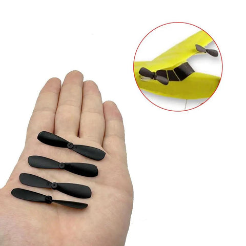 Hand holding 10Pcs Mini Propellers 46mm Two Blade Nylon Positive And Negative Props for RC Airplane and Helicopter Kit