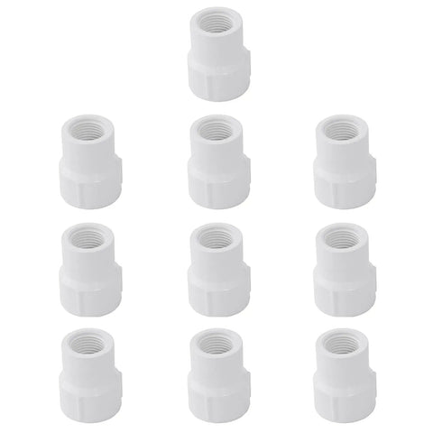 Ten Pack PVC Reducing Female To Female Threaded Couplings Three Quarter Inch To One Inch White For Pipe Pressure Fittings arranged in rows