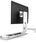 Universal Monitor Wall Mount With Smooth Swivel Adjustment For Effortless Office Desk Organization showing a silver steel bracket supporting a monitor.