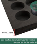 Close-up of the black foam tray section of Neat 40 Pod Coffee Pod Organizer Drawer Tray, showing K-Cup slot and 1-inch thickness.