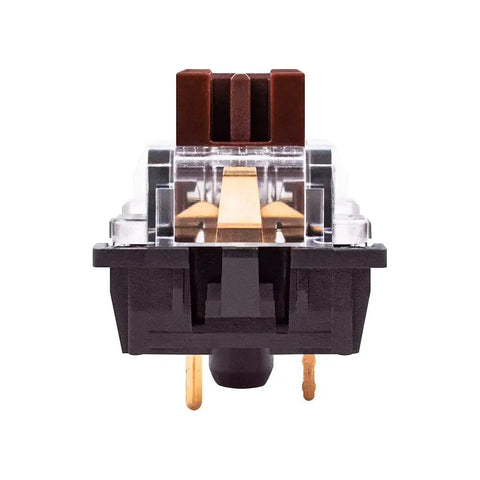 Close-up front view of a switch from the 32 Pack 3 Pin Tactile Brown Switches for Mechanical Gaming Keyboards - DIY Replacement Compatible With Cherry MX Brown and Gateron Brown, Fits MX Standard Keyboards Like Redragon MechanicalEagle E-yooso and More.