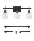 5-Piece All-In-One Matte Black Bathroom Set With 3-Light Vanity Fixture Featuring Seeded Glass Shades Plus Towel Bar, Towel Ring, Robe Hook, And Toilet Paper Holder For A Sleek Modern Industrial Vibe.