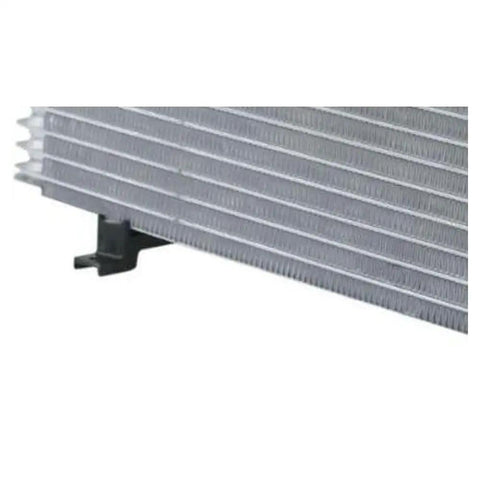 Premium Transmission Oil Cooler Kit For GMC Sierra 2500HD And 3500HD Pickup Trucks With The Mighty 6.6L Diesel Engine From Model Years 2011 Through 2014 Guaranteed To Keep Your Rig Cool And Running Smooth On Any Tough Road Trip Without Overheating Issues. close-up aluminum transmission cooler