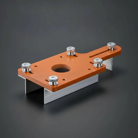 Precision Slotting Router Guide Jig Template Featuring Adjustable Clamping Block And Heavy Duty Metal Plate For Dead Accuracy On Cabinet And Drawer Build Projects, orange jig with metal plate.