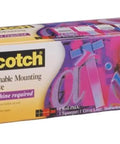 Positionable Mounting Adhesive 568 box with colorful design and text, highlighting odorless, repositionable, permanent bonding features.