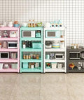 Adjustable Three Tier Metal Storage Shelves Free Standing Garage And Kitchen Shelving Unit Heavy Duty Carbon Steel Organizer Rack For Home Office in pink, mint, and black with kitchen appliances and containers.