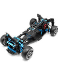 Rear Wheel Drive Drift Frame Kit For One-Tenth Scale Mini RC Cars With Upgraded DIY Drifting Frame And Ultra Wide Angle Steering Perfect For Beginners And Drift Enthusiasts Looking To Rip The Track, showcasing carbon fiber chassis with alloy parts and wheels, angled view.