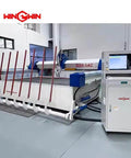 Front view of a white and blue waterjet cutting machine with a WINWIN control cabinet.