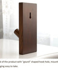 Back view of Slick Wall Mounted Coat Rack With Nifty Key Organizer Hook For Bathroom Entryway Closet showing gourd shaped hook hole.