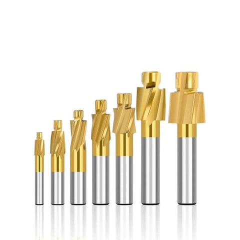 WZFC counterbore end mill set; nine gold-coated cutters with silver shanks for metal milling (front view).