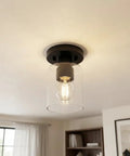 Industrial Semi Flush Mount Ceiling Light With Cylinder Glass Shade And E26 Base for kitchen island, black matte finish installed